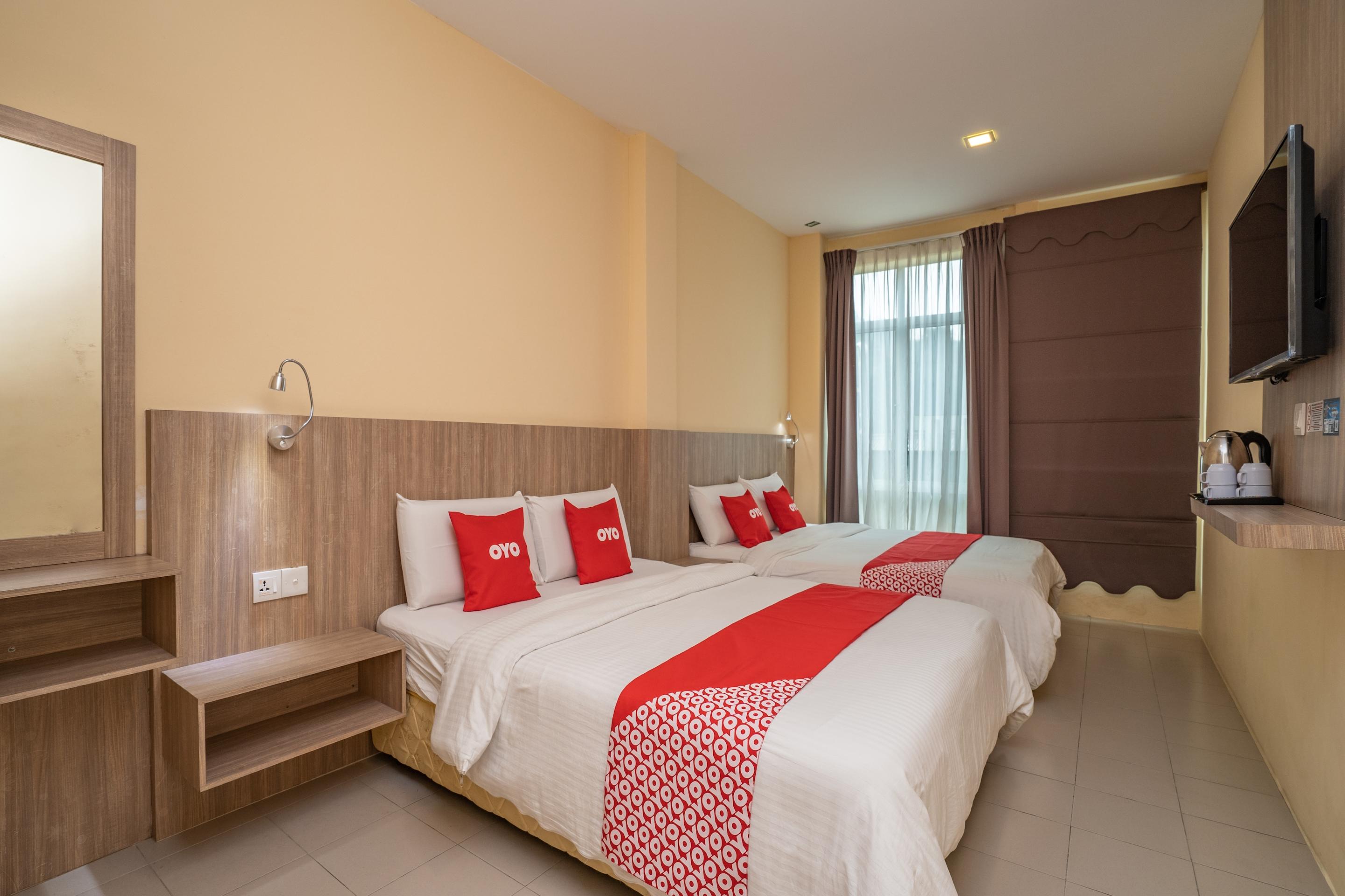 Oyo 44078 The Island Hotel Kampong Pasir Bogak Kültér fotó