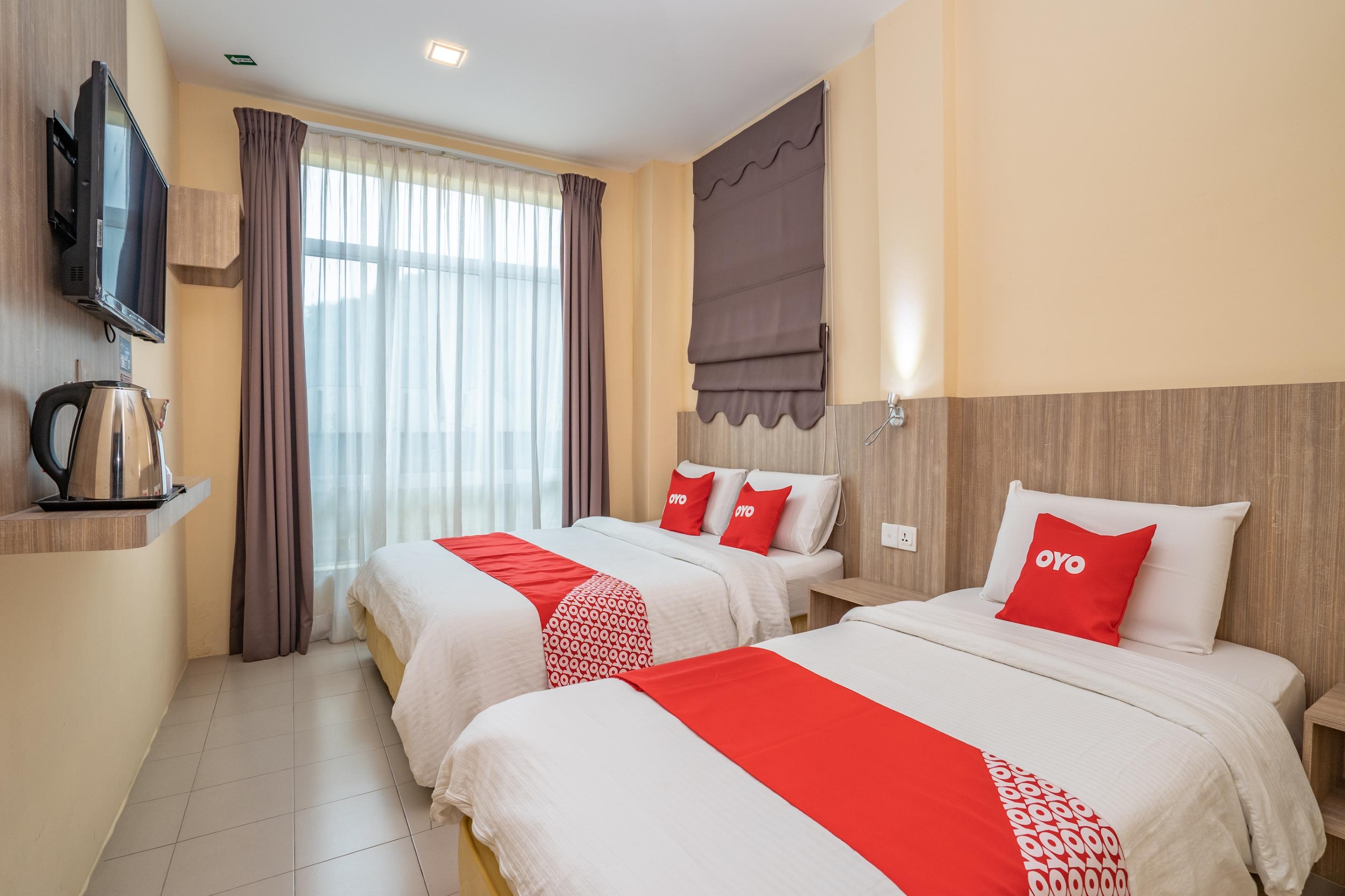 Oyo 44078 The Island Hotel Kampong Pasir Bogak Kültér fotó
